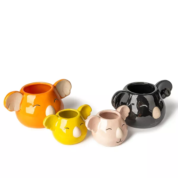 கோலா வடிவ பீங்கான் மெழுகுவர்த்தி வைத்திருப்பவர்கள்